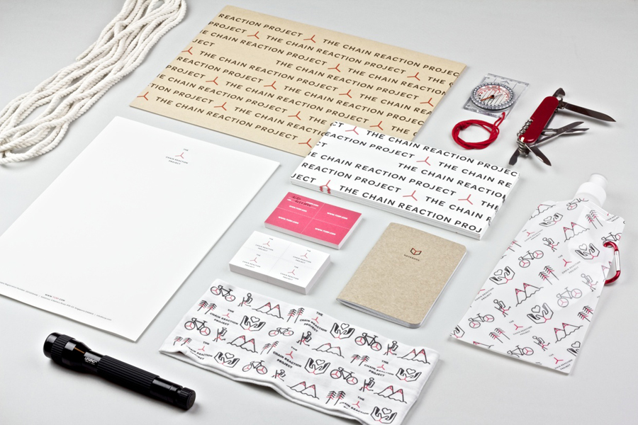 Logo and stationery with iconography detail for The Chain Reaction Project designed by Bravo Company