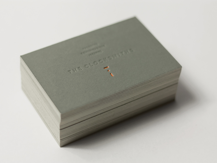 Copper foil and blind deboss business card designed by The Clocksmiths