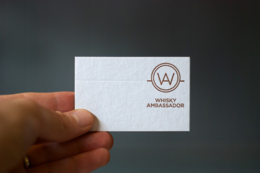 Logo and business card with copper print detail designed by O Street for Whisky Ambassador