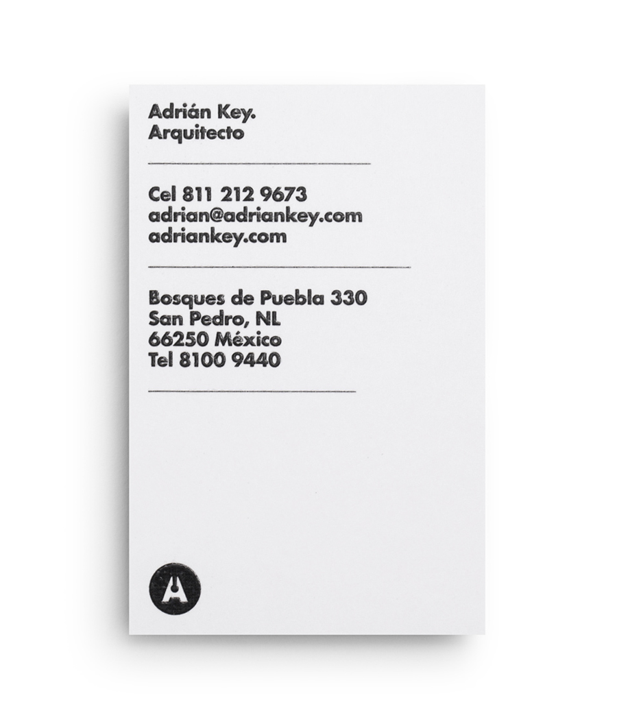 Duplex business card with thermographic ink and silver foil detail designed by Face Creative for MX architecture firm and architect Adrián Key