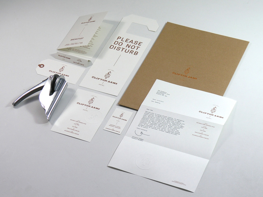 Logo, menus and stationery with copper spot and foil print treatments and emboss detail designed by Wash for the Clifton Arms Hotel.