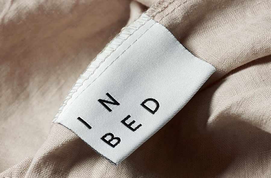 Logo and label for online linen retailer In Bed designed by Moffitt.Moffitt