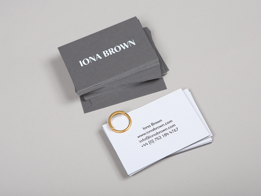 Logotype and duplex Colorplan grey business card with white foil detail for contemporary jewellery designer Iona Brown