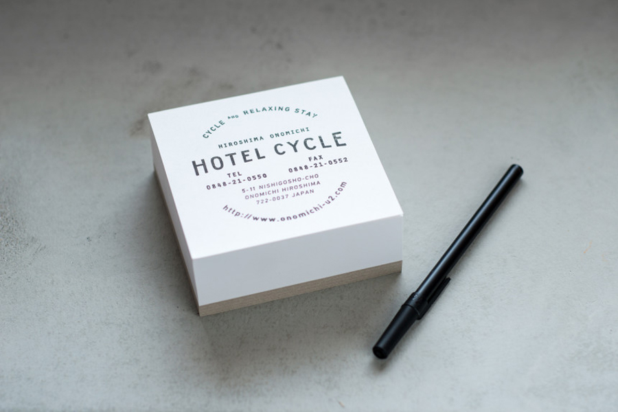 Logotype and notepad designed by UMA for U2's Onomichi based Hotel Cycle