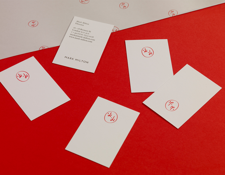 Logo and business cards with a red spot colour detail designed by ico for jewellery brand Mark Milton