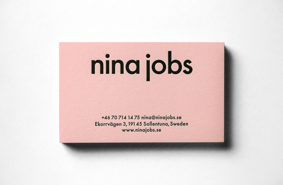 Logotype and pink board business card for industrial designer Nina Jobs designed by BVD