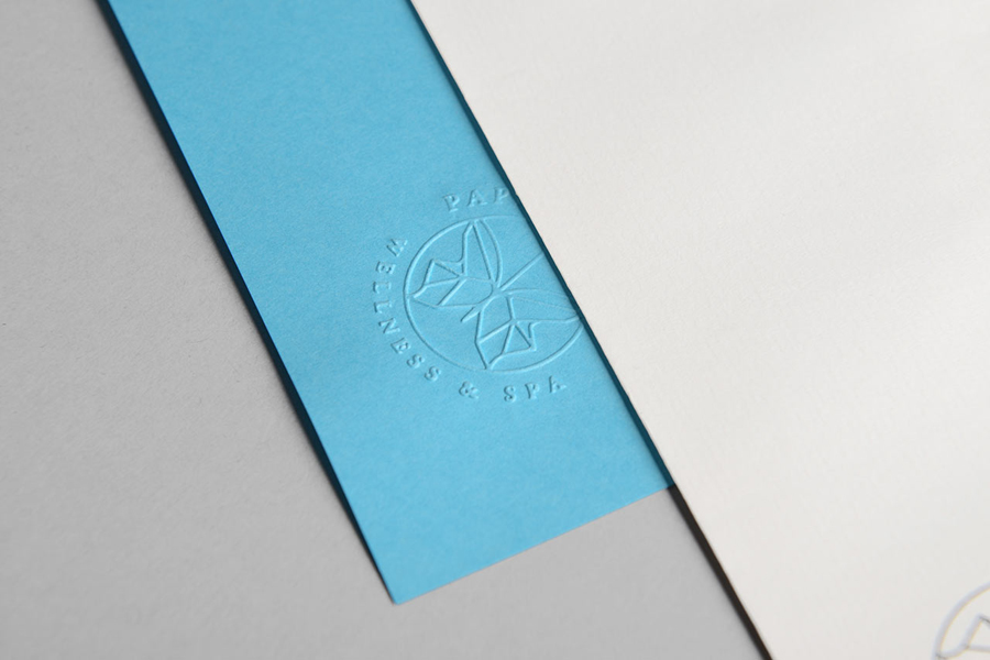 Logo and stationery with coloured paper and blind deboss detail designed by Sciencewerk for Indonesian spa Papillon Blu