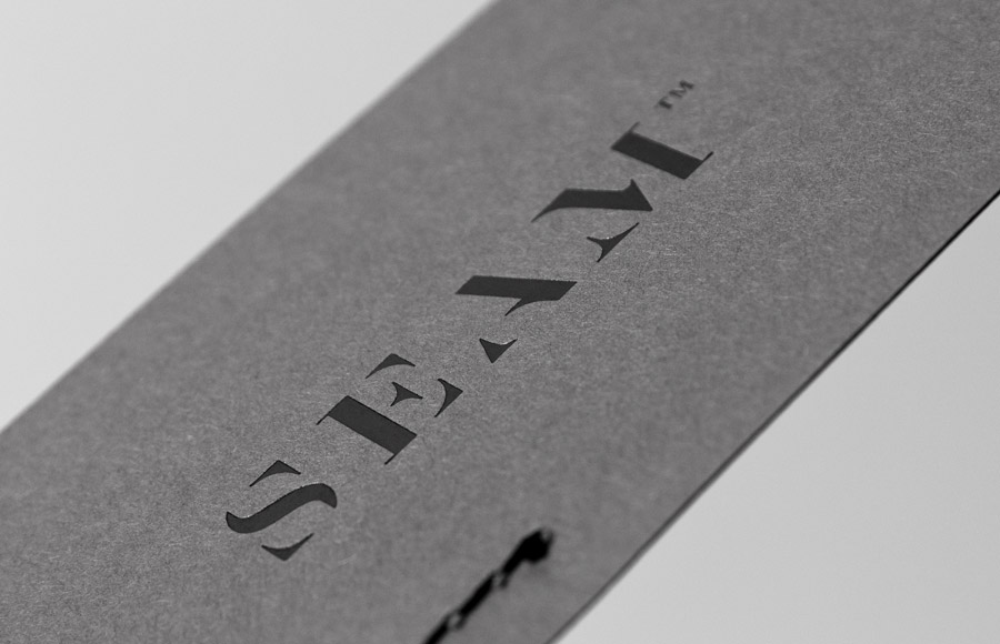 Logo and business card with black block foil detail designed by For Brands for fashion brand Seam