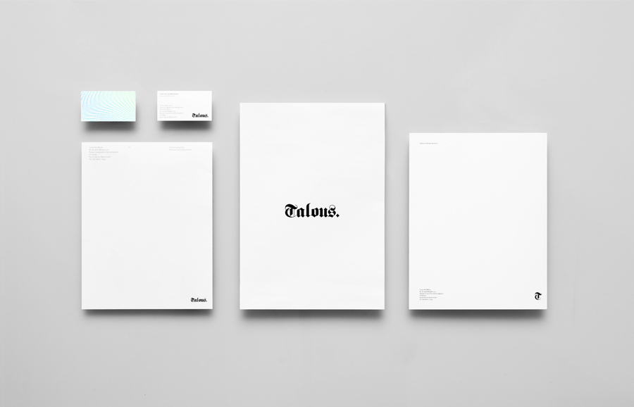 Logo, business card and stationery with guilloché pattern detail for boutique financial consulting firm Talous designed by Anagrama