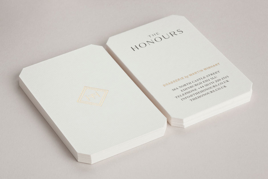 Logo and print work with gold foil and embossed paper detail for brasserie The Honours designed by Touch