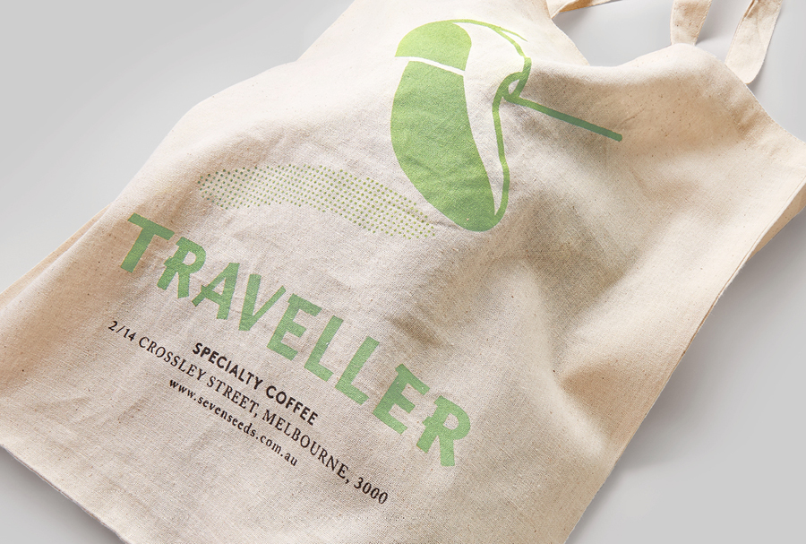 Logo and logotype as a print detail across a tote bag for Melbourne espresso bar Traveller designed by The Company You Keep