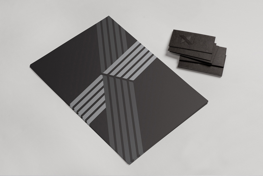 Logo, folder and duplex business card with black foil detail for web developer Zann St Pierre created by ThoughtAssembly