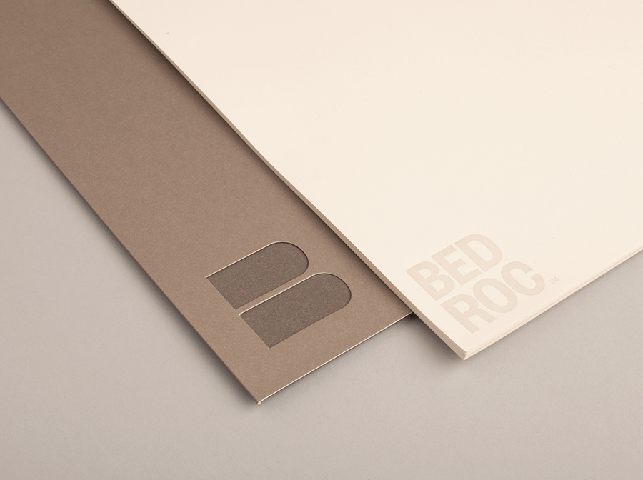 Logo and folder with die cut detail for technological consultancy firm Bed Roc designed by Perky Bros