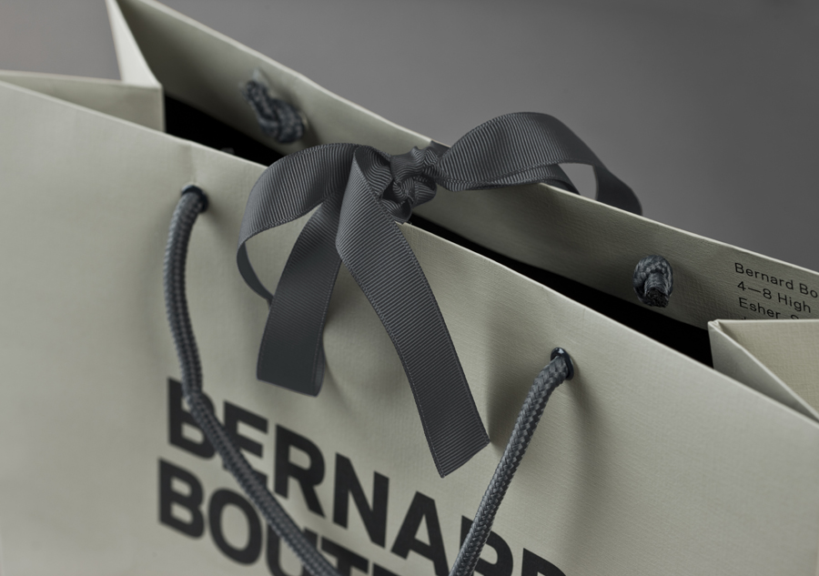 Logo and ribbon tied bags for award-winning fashion store Bernard Boutique designed by Bunch