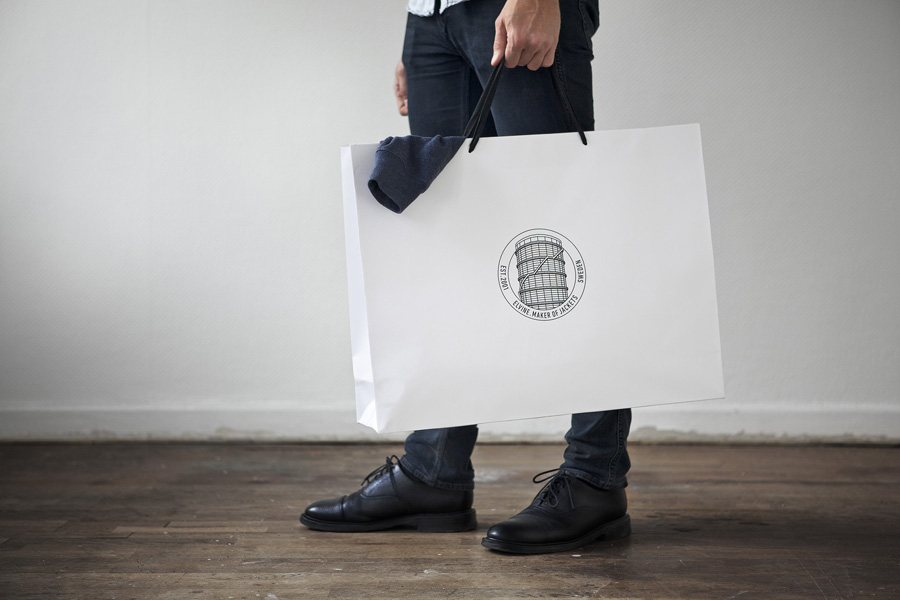 Logo and shopping bag for Swedish clothing brand Elvine designed by Lundgren+Lindqvist