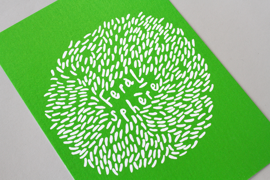 Logo and print with a bright fluorescent spot green print finish designed by Mind for fashion label Feral Sphere