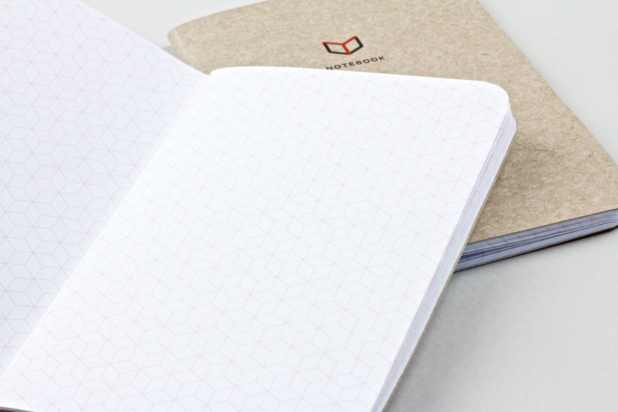 Notebook with icon and logo detail for The Chain Reaction Project designed by Bravo Company