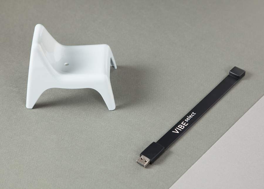 Sans-serif logotype and wristband USB dongle for architectural firm Vibe Select designed by Studio Constantine