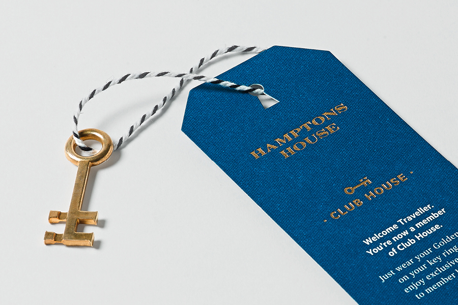 Tag with gold foil and die cut detail designed by Moffitt.Moffitt for Sydney furniture and homeware retailer Hamptons House