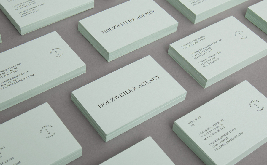 Logo and coloured board business card designed by Bielke+Yang for contemporary fashion distributor Holzweiler