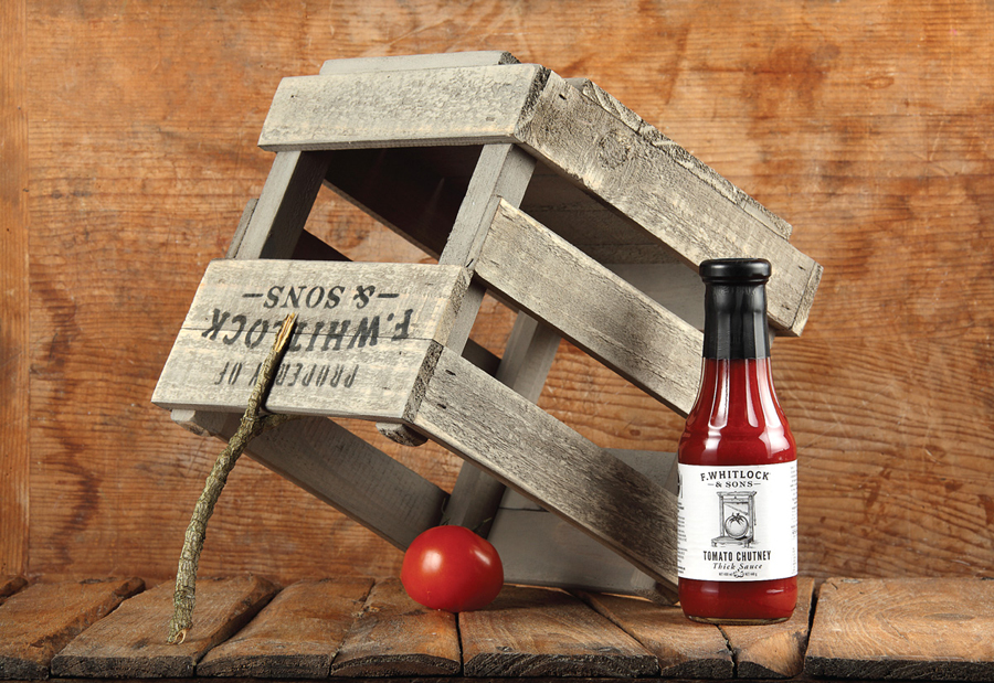 Packaging with etched illustrative detail for sauce and pickle brand F. Whitlock & Sons designed by Marx