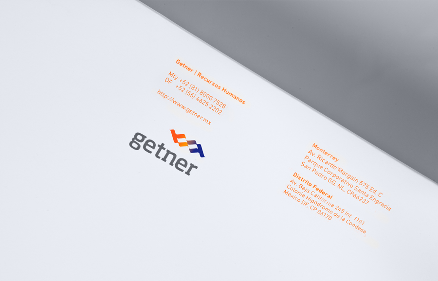 Logo and headed paper for payroll management company Getner designed by Anagrama