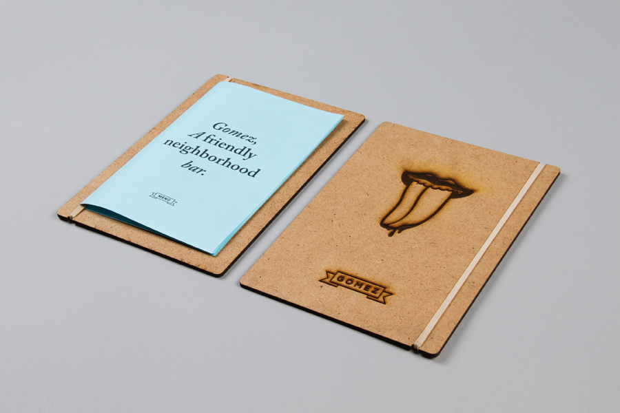 Logo and menu with heat treatment designed by Savvy for San Pedro-based bar Gomez