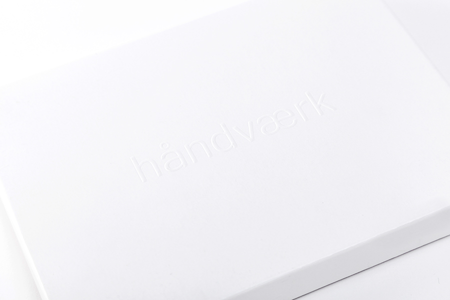 Packaging with blind emboss logotype detail designed by Savvy for fashion brand Handvaerk