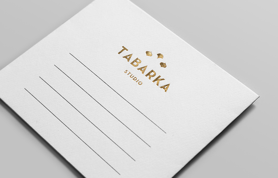 Logo and stationery with gold block foil detail designed by Anagrama for handcrafted terracotta tile specialist Tabarka Studio