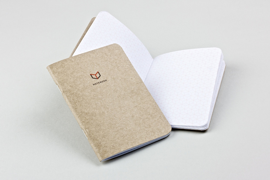 Notebook with icon and logo detail for The Chain Reaction Project designed by Bravo Company