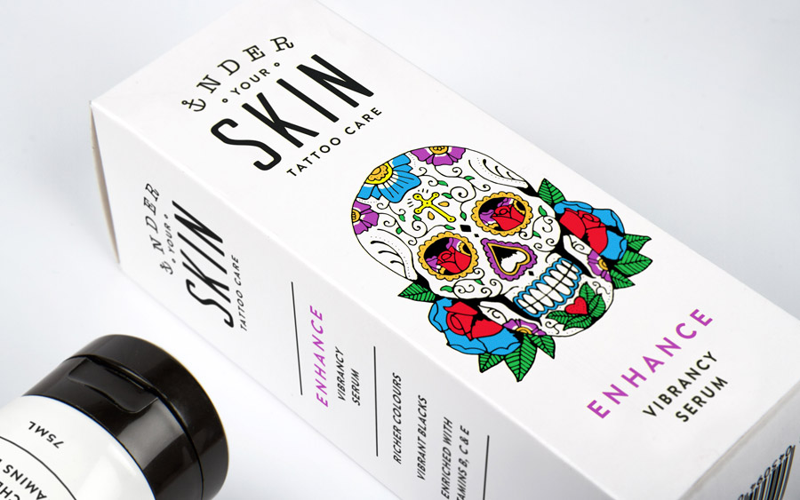 Packaging with bright illustrative detail by Robot Food for tattoo care range Under Your Skin 