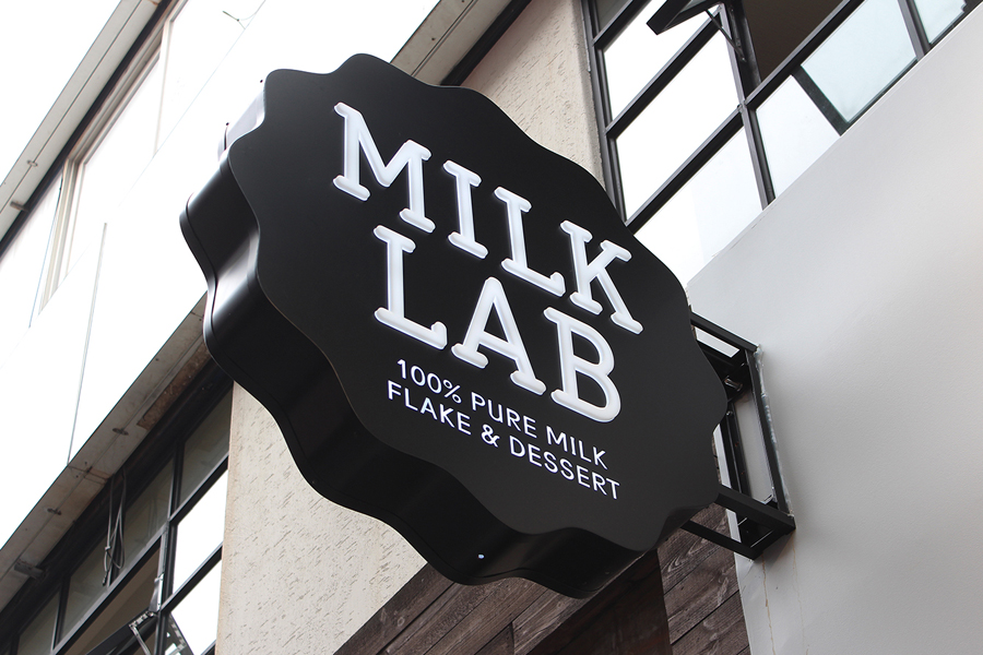 Logo, illustration, print and exterior signage designed by Studio FNT for South Korean dessert restaurant Milk Lab