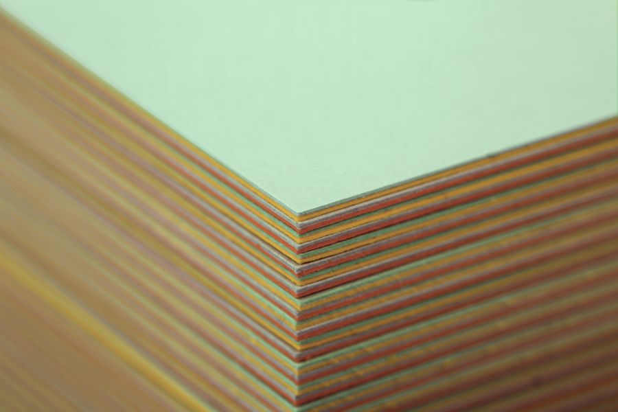 Business card constructed from coloured board using a marquetry technique designed by Bunch for digital design studio Sebazzo