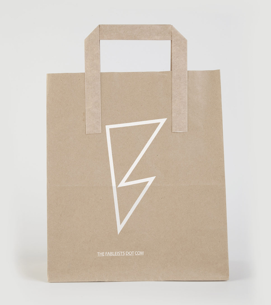 Logo and uncoated, unbleached bag with white ink finish for children's fashion brand The Fableists designed by Freytag Anderson featured on BPO