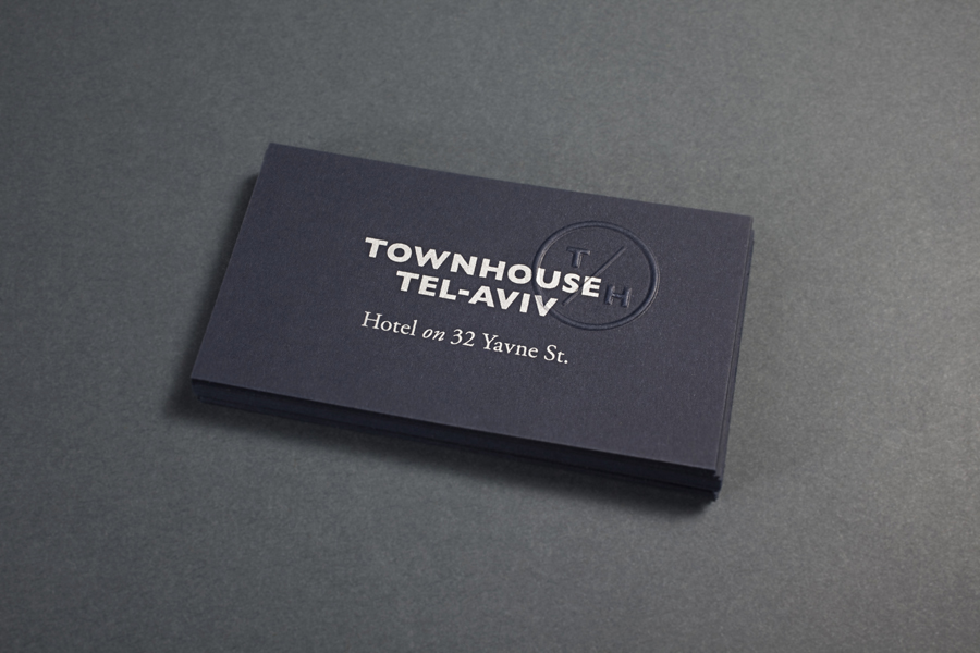 Logo and business card with blind emboss monogram detail for Tel Aviv hotel Townhouse designed by Koniak