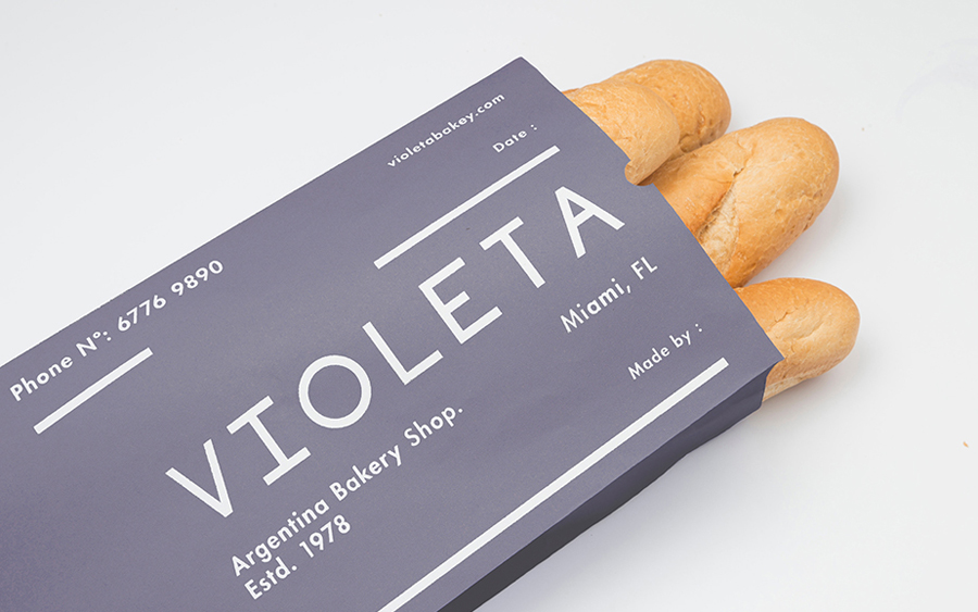 New logo, packaging and stationery with gold foil detail designed by Anagrama for traditional Argentinian bakery Violeta