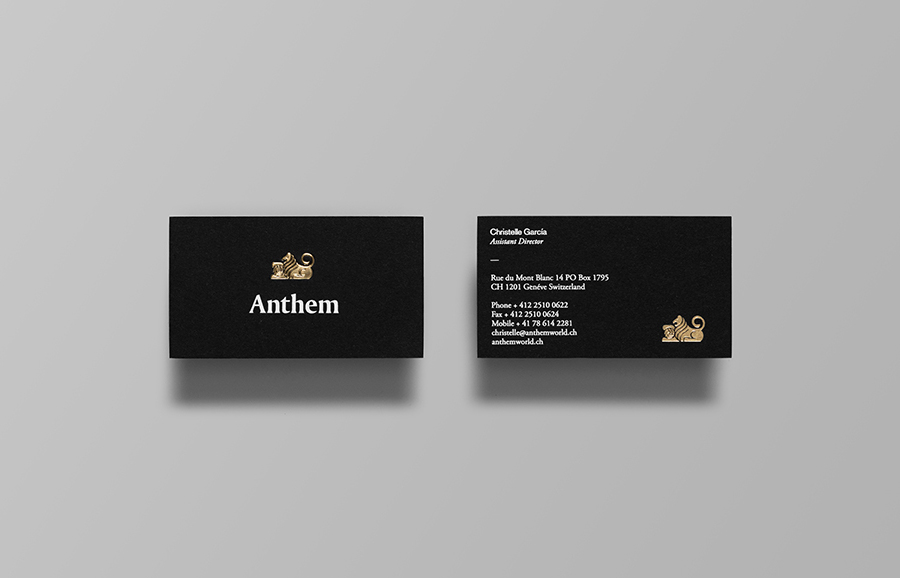 Logo and business card with embossed gold foil and white foil detail by Anagrama for football scout and transfer business Anthem