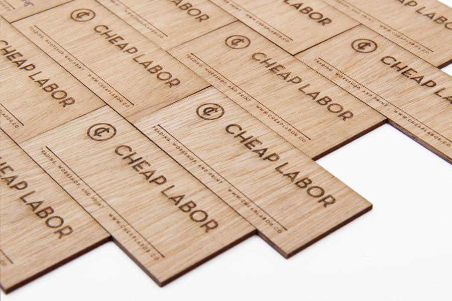 Logo and wooden business cards with heat treated detail for craft retail site Cheap Labor designed by Sciencewerk