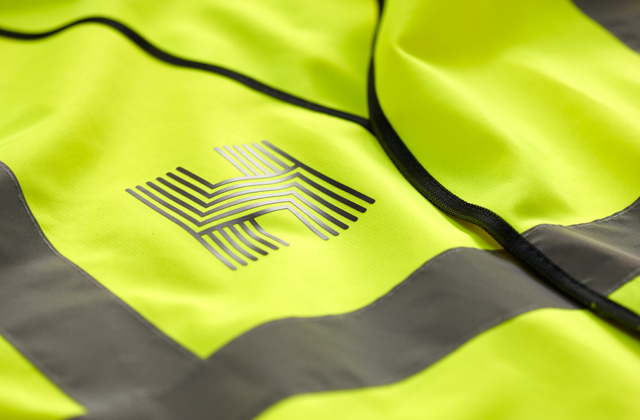 Logo on a high vis jacket designed by Spy for architecture firm Haverstock