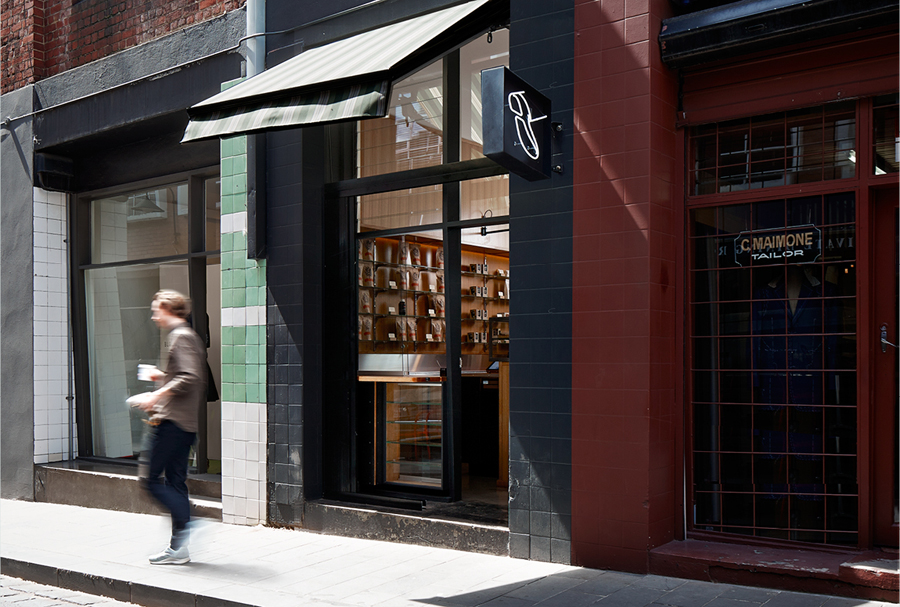 Logo as an exterior neon sign designed by The Company You Keep for Melbourne espresso bar Traveller