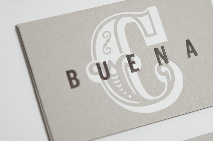 Logo and white and black ink business card designed by Tres Tipos Gráficos for Spanish event planning business Buena C