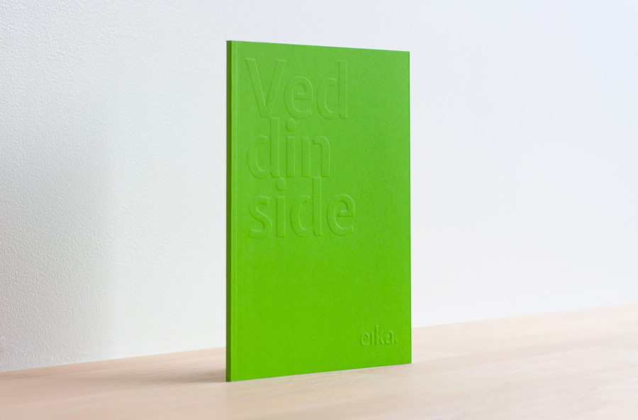 Brand book with green spot and blind emboss detail designed by Mission for local bank alliance Eika