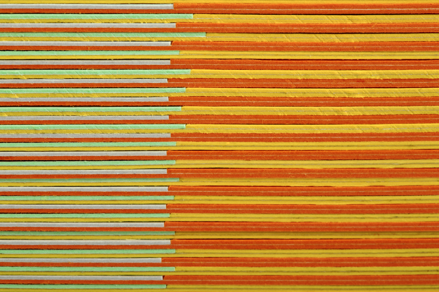 Business card constructed from coloured board using a marquetry technique designed by Bunch for digital design studio Sebazzo