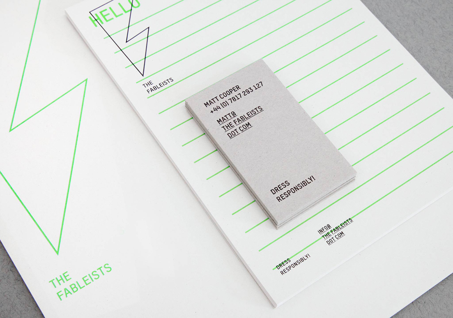 Logo and uncoated, unbleached stationery with fluorescent green ink print finish for children's fashion brand The Fableists designed by Freytag Anderson featured on BPO