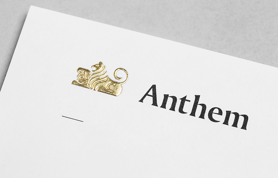 Logo and headed paper with embossed gold foil detail by Anagrama for football scout and transfer business Anthem