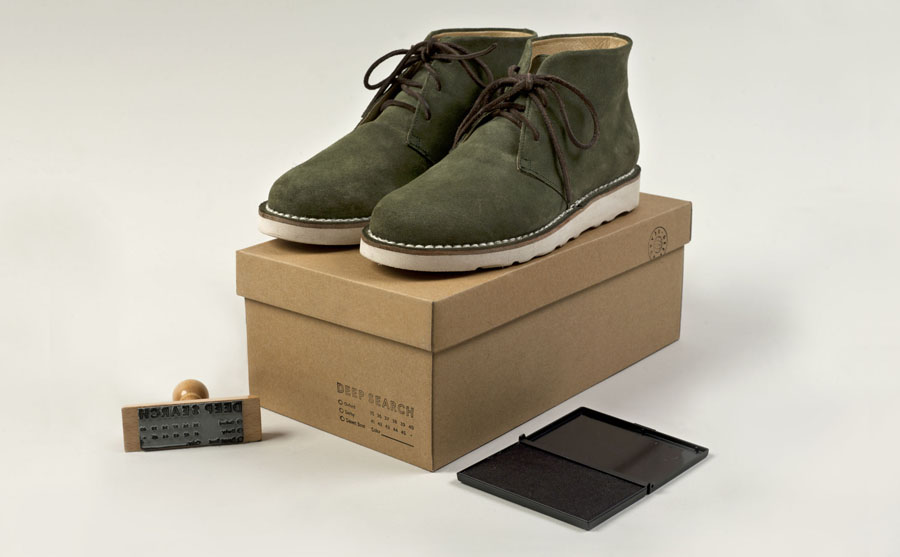 Box with uncoated, unbleached material and stamp detail created by Bielke+Yang for Norwegian shoe brand Deep Search