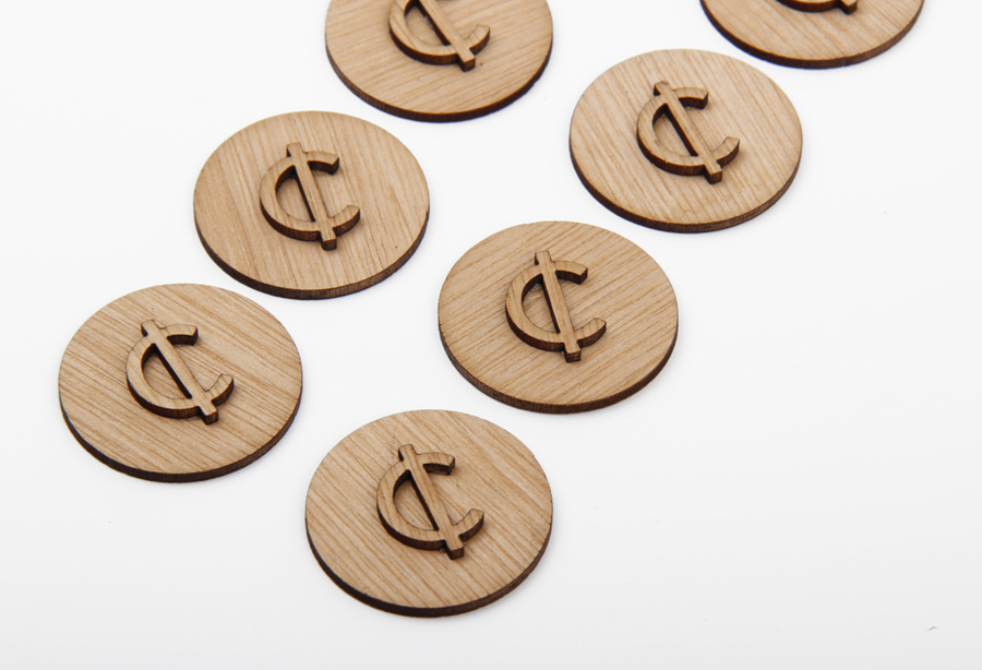 Wooden tokens for craft retail site Cheap Labor designed by Sciencewerk