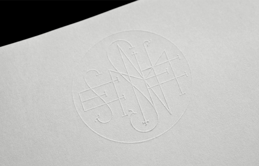 Logo and letterhead with a blind embossed detail designed by Anagrama for Latin American horror film production company Nemesis Films