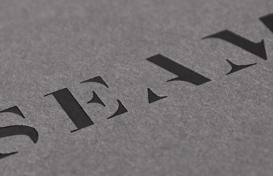 Logo and business card with black foil detail designed by For Brands for fashion brand Seam