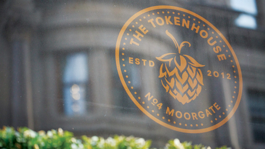 Logo and window decal created by Designers Anonymous for The Tokenhouse